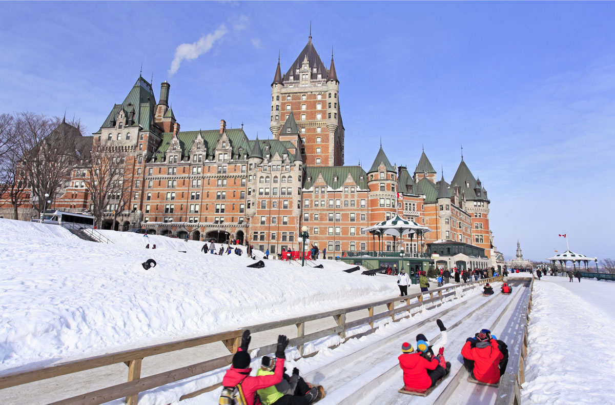 Quebec City in winter with a traditional slide descent.