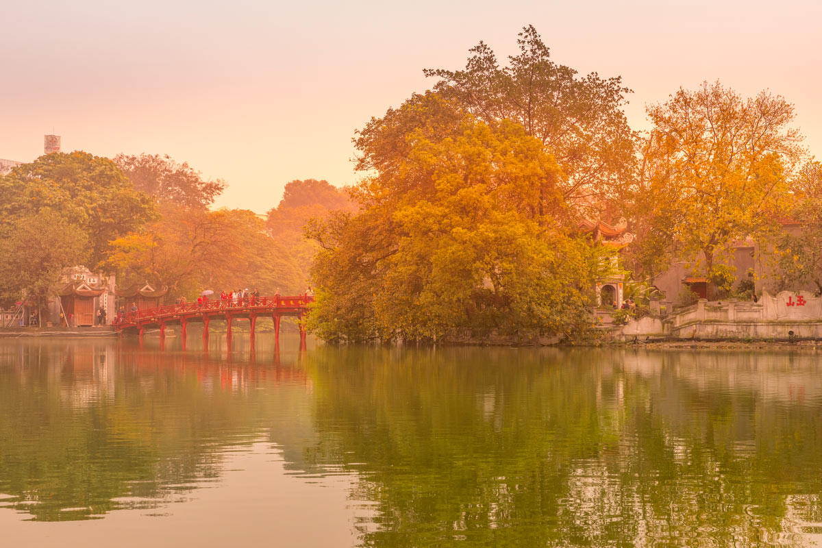 Red wooden Huc Bridge from the Ngoc Son Temple