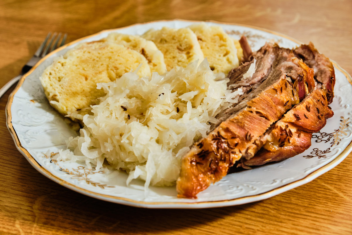 Traditional tasty czech food ,vepro knedlo zelo, pork meat with dumplings and cabbage