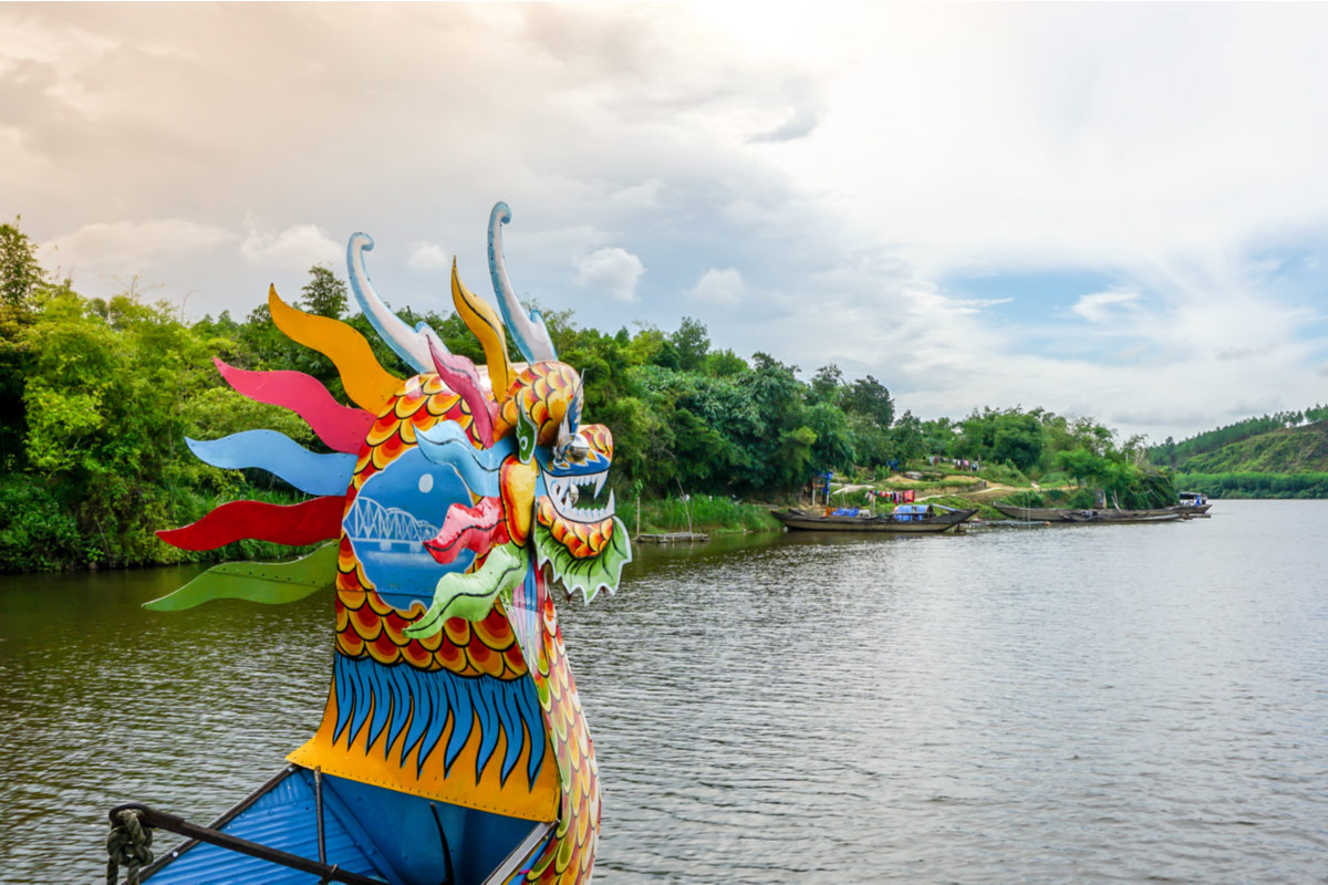 Typical dragon boat on the Perfume River in Hue, Vietnam