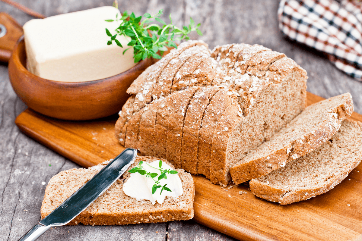 Loaf of Irish soda bread with butter St. Patrick's Day
