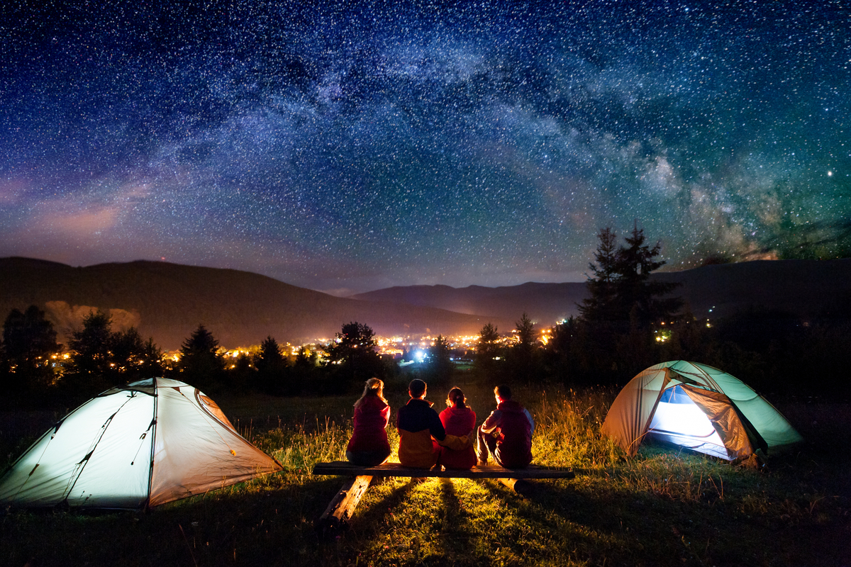 Family camping and stargazing