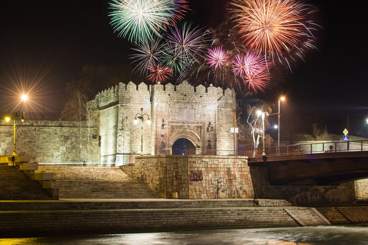 View of Nis FOrtress with fireworks in the night sky travelling to Serbia