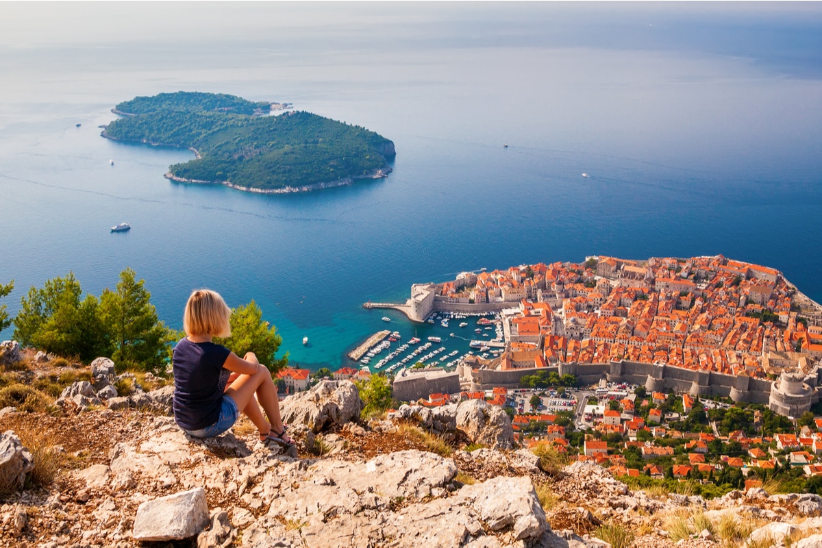 Woman views Dubrovnik from Mount Srd Croatia Balkans