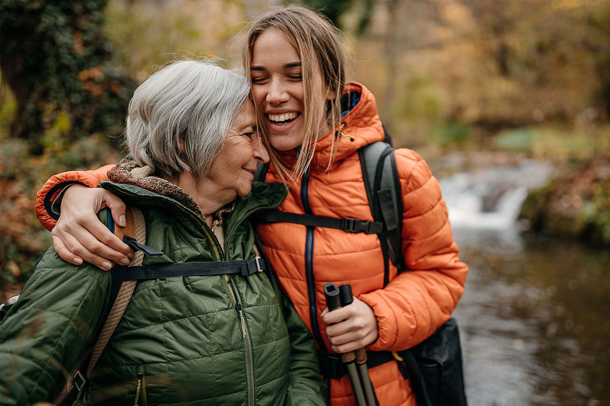 Mother and daughter hiking together